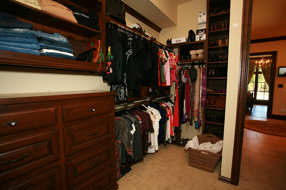 Master closet with complete use of space from floor to ceiling
