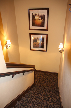 Stairwell to guest suite & gym