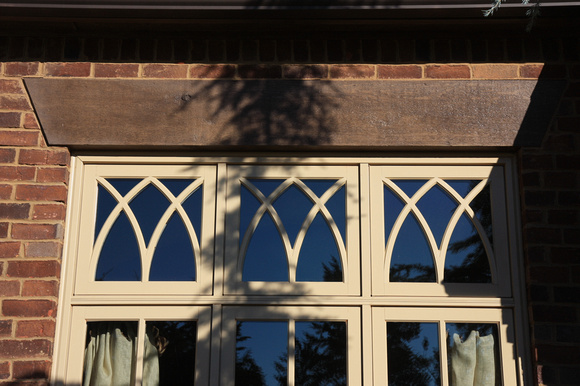 Kolbe & Kolbe wood windows with custom gothic arches